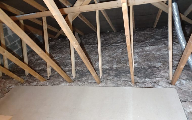 New loft insulation with a raised storage deck going down in Kirkby in Ashfield