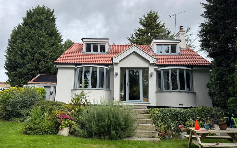 The Ravenshead dormer bungalow with its new roof and rendered walls